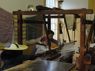 Weaving a mat to take back to school